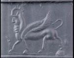 Striding human-faced winged bull