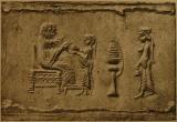 Offering scene: Two female worshippers received by seated goddess (or queen)